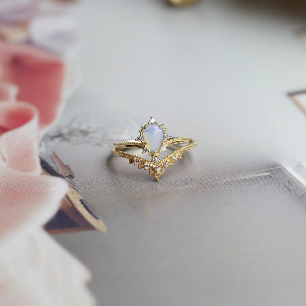Anello pietre blu e opale