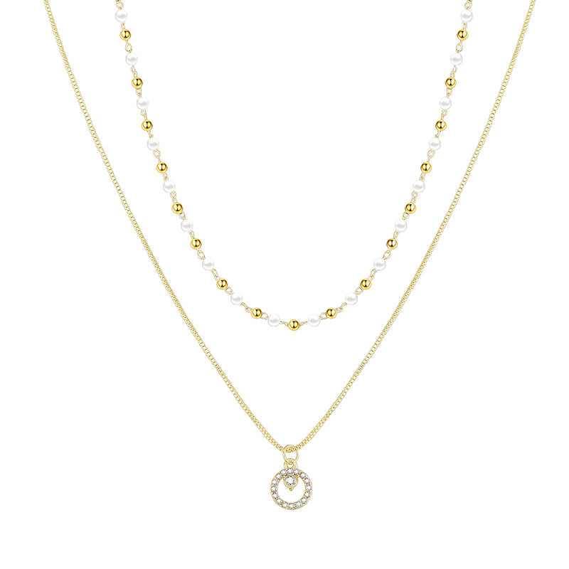 Collana anello doppia perla