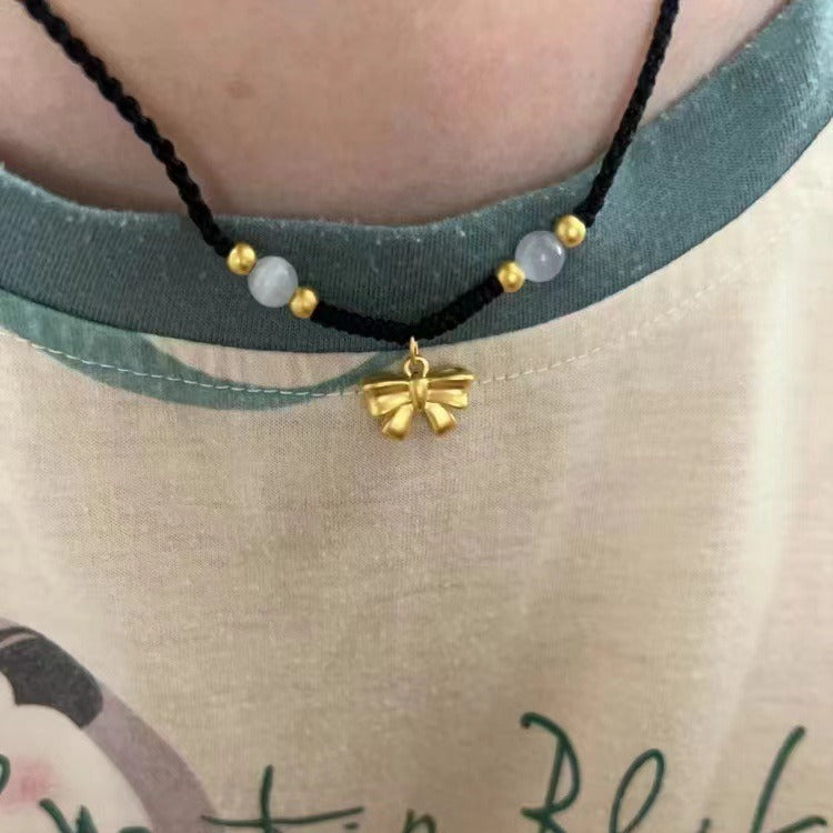 Collana fiocco intrecciata oro