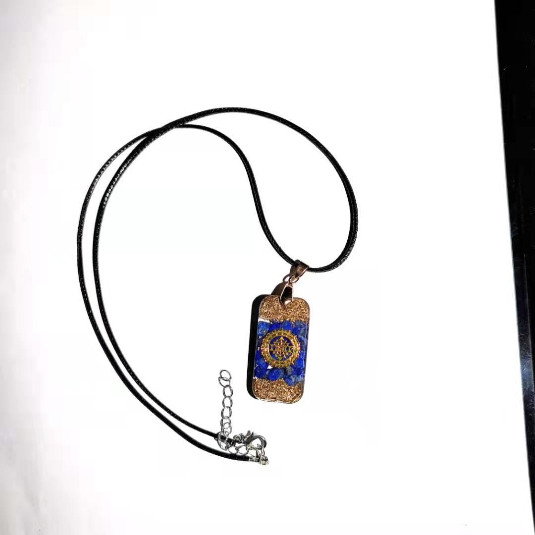 Collana pendente resina cristalli