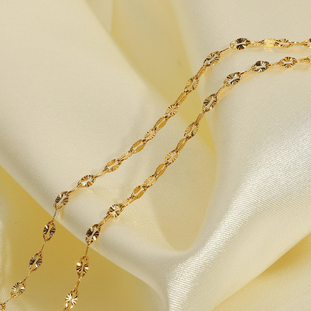 Collana acciaio labbra