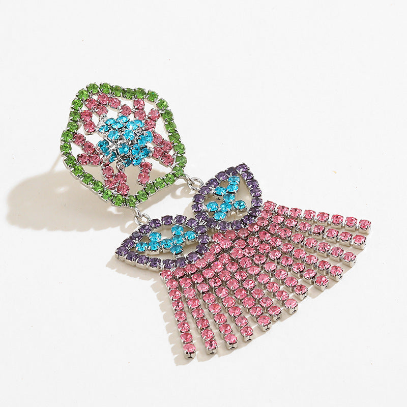 Orecchini geometrici con nappe