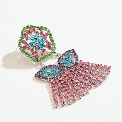 Orecchini geometrici con nappe