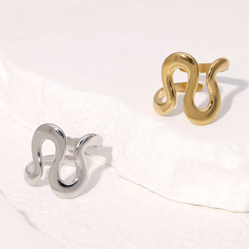 Anello titanio geometrico regolabile