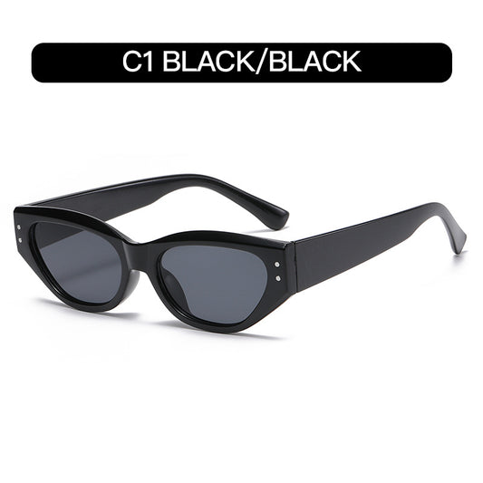 Occhiali da sole cat-eye con rivetti