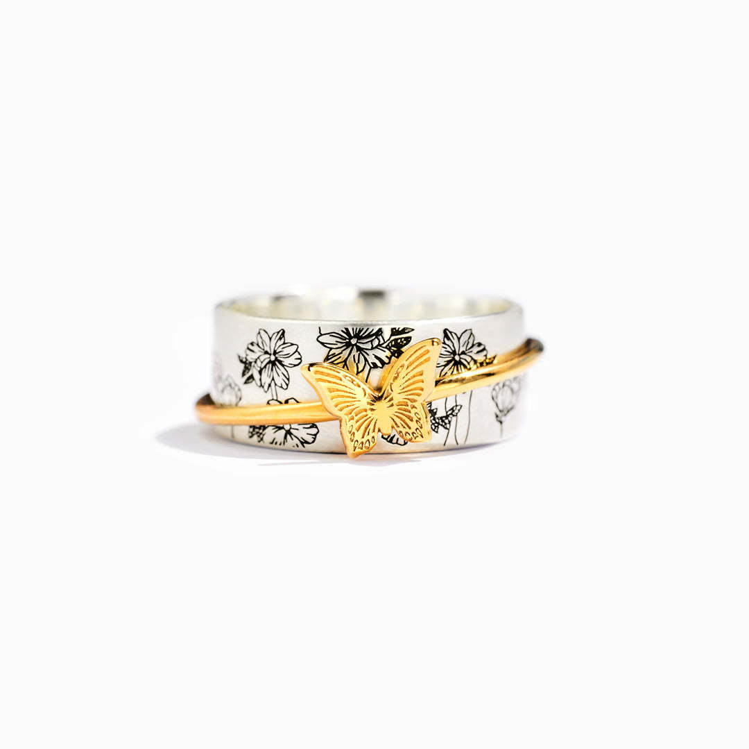 Anello farfalla rotante