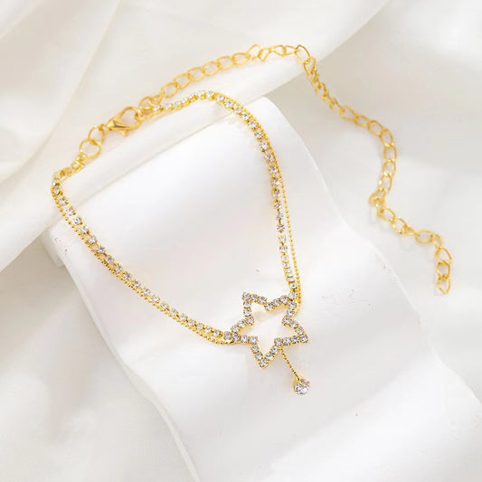 Collana stella e cuore da donna