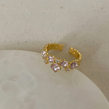 Anello farfalla e fiore viola