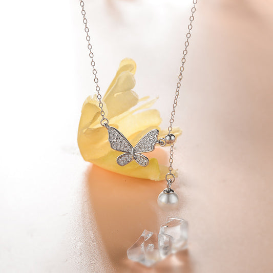 Collana farfalla perla nappa
