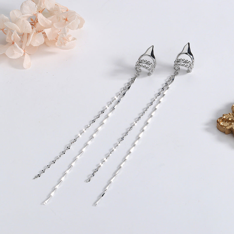 Orecchini clip geometrici con catena