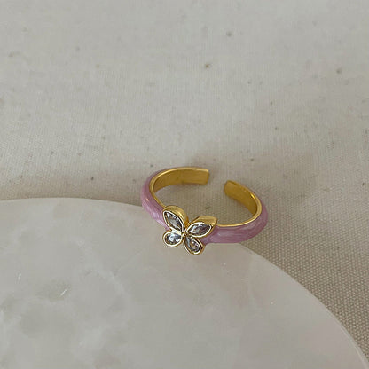 Anello farfalla e fiore viola
