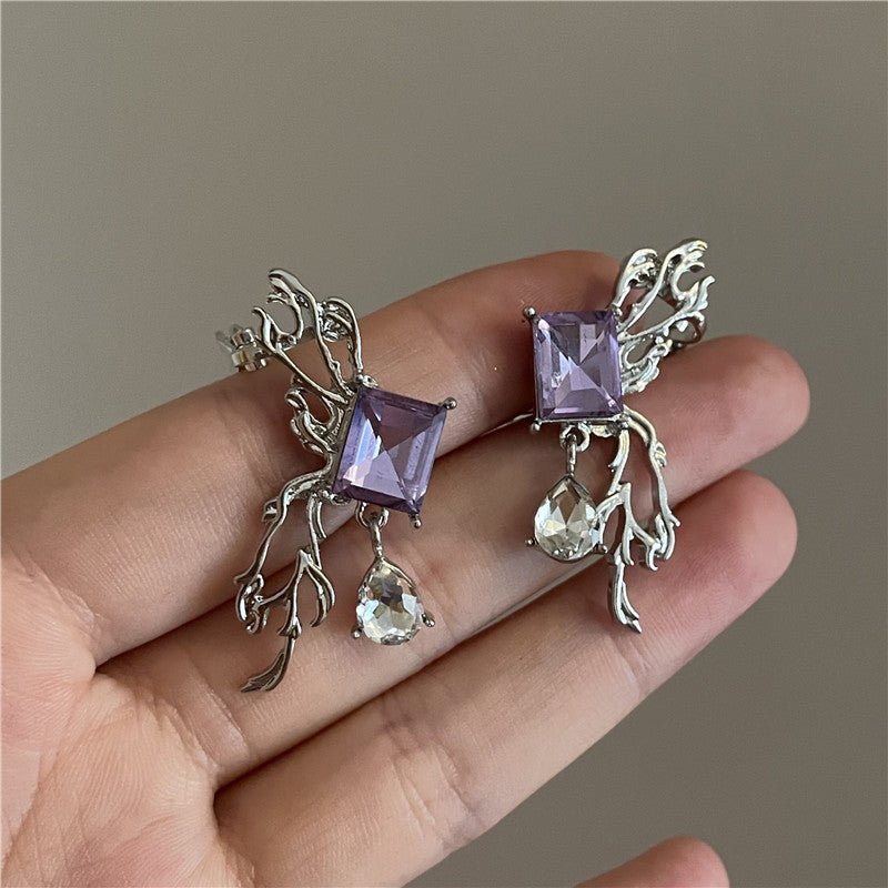 Orecchini farfalla diamante viola