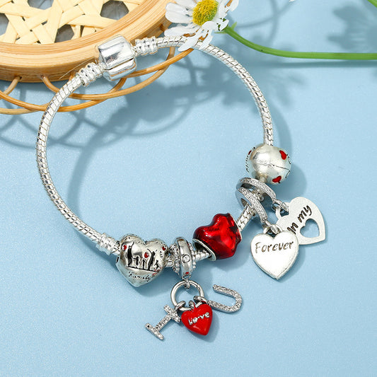 Bracciale cuore rosso in oro