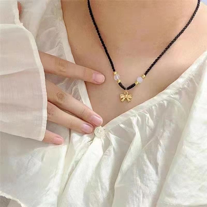 Collana fiocco intrecciata oro