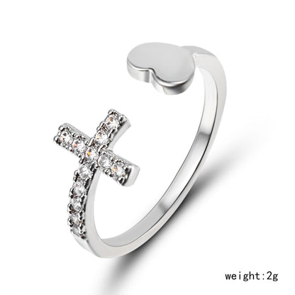 Anello croce diamante