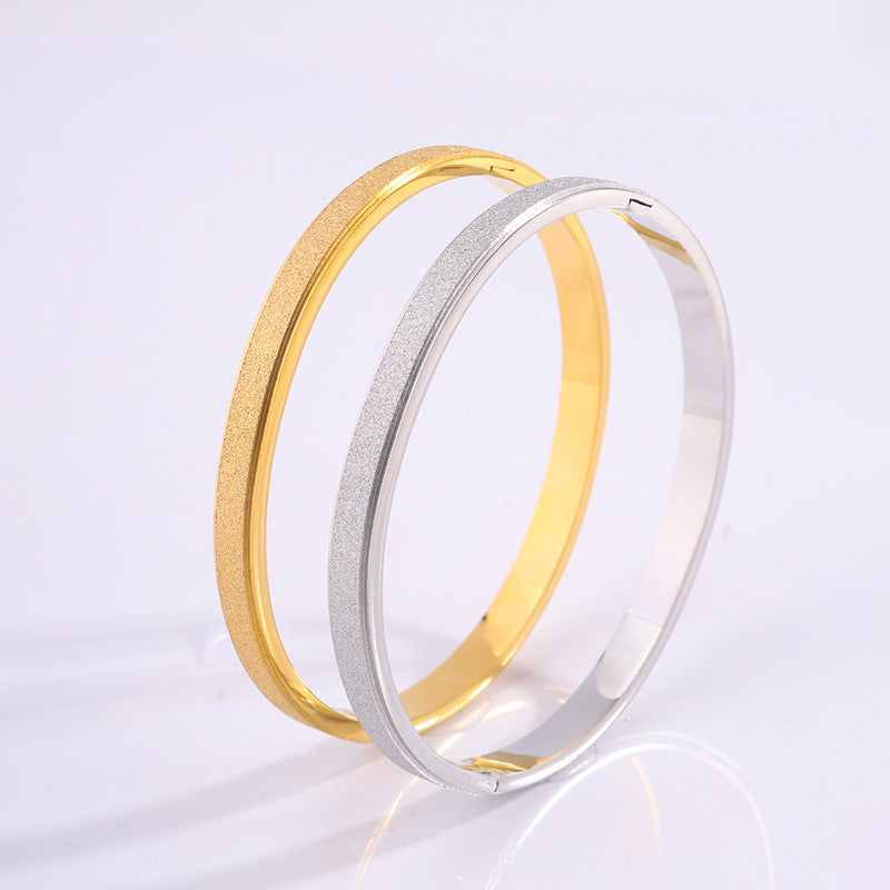 Braccialetto titanio stelle oro