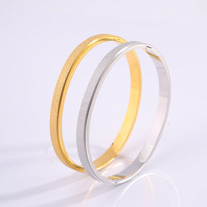 Braccialetto titanio stelle oro