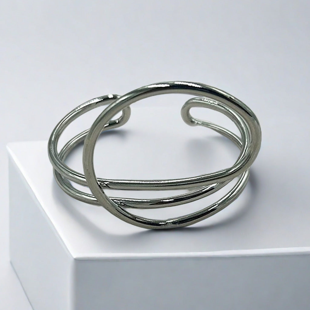 Bracciale geometrico regolabile