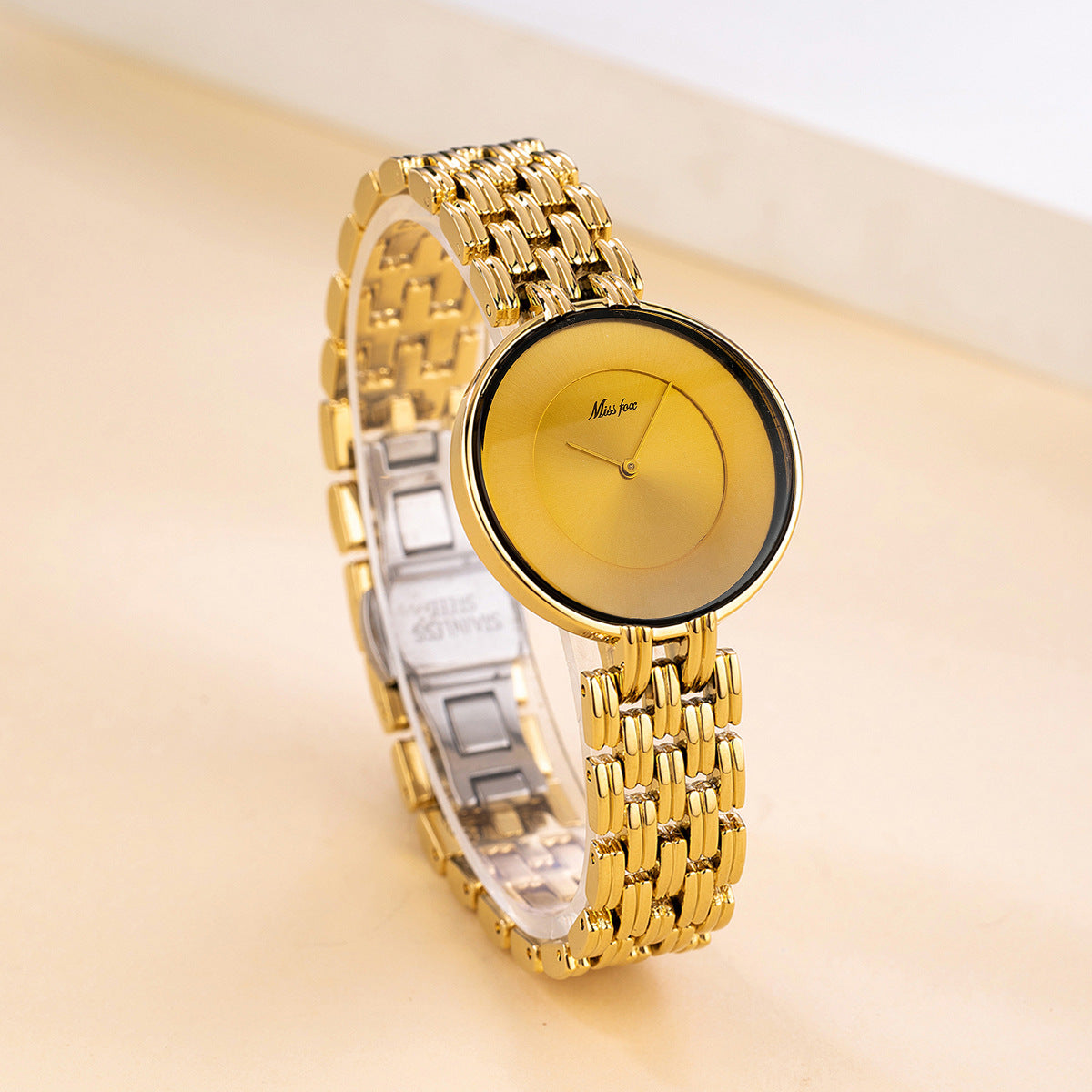 Orologio al quarzo quadrante oro e nero