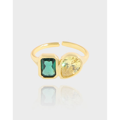 Anello smeraldo e zircone geometrico