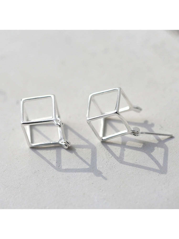 Orecchini cubi traforati argento
