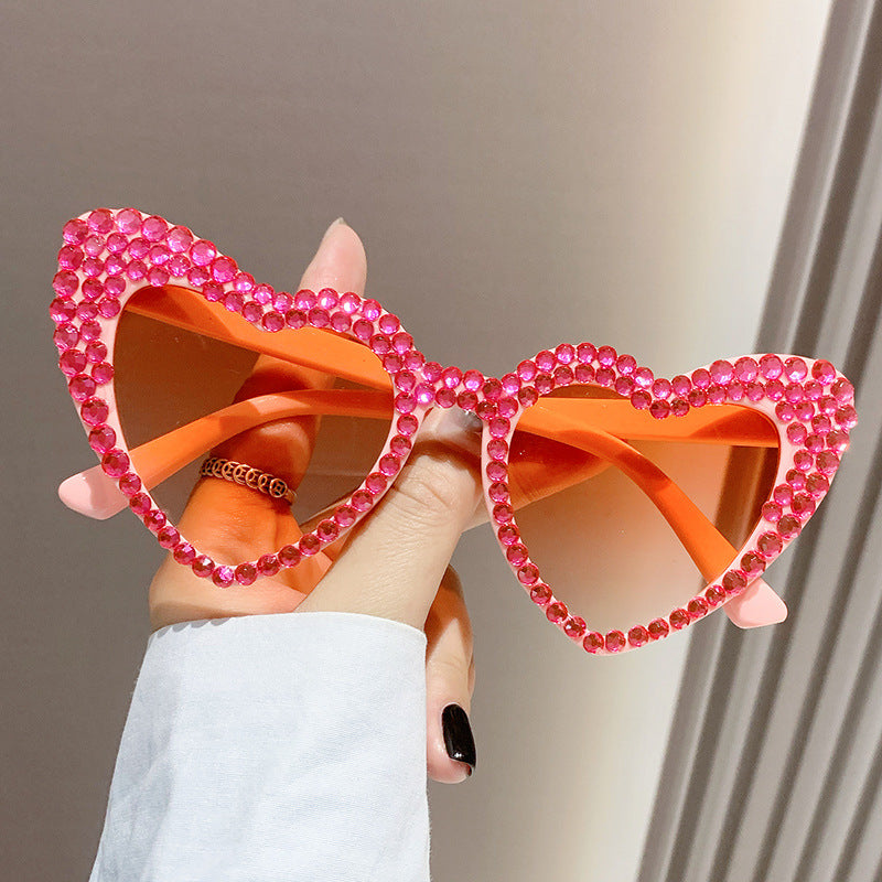 Occhiali da sole cat-eye da donna con cuore