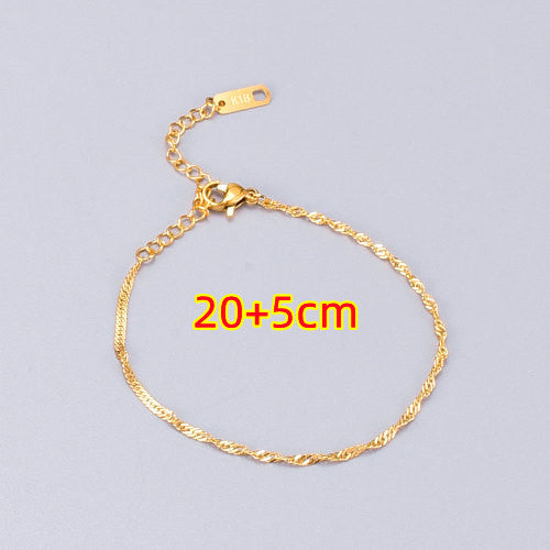 Bracciale titanio placcato oro a spira