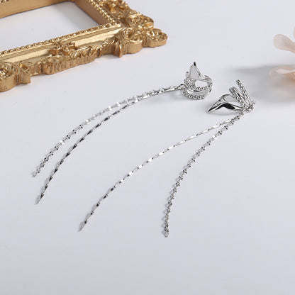 Orecchini clip geometrici con catena