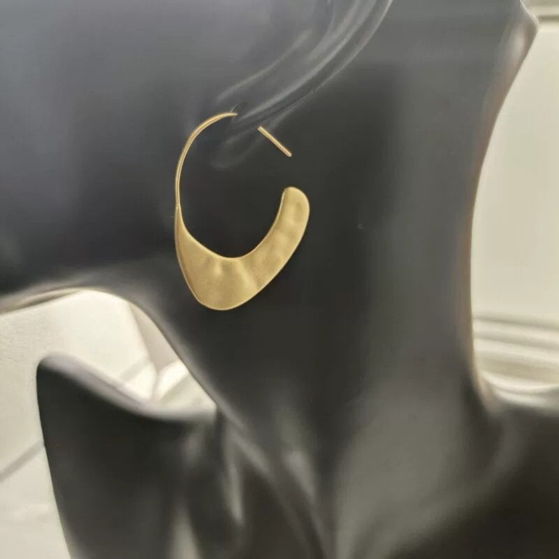 Orecchini geometrici dorati in ottone