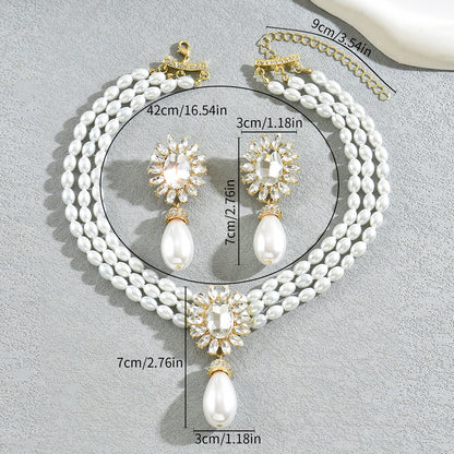 Set collana e orecchini perle geometriche