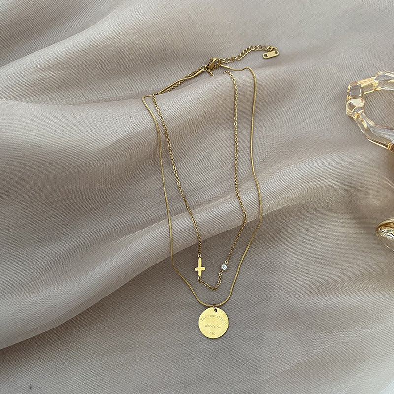 Collana doppio strato titanio con pendente