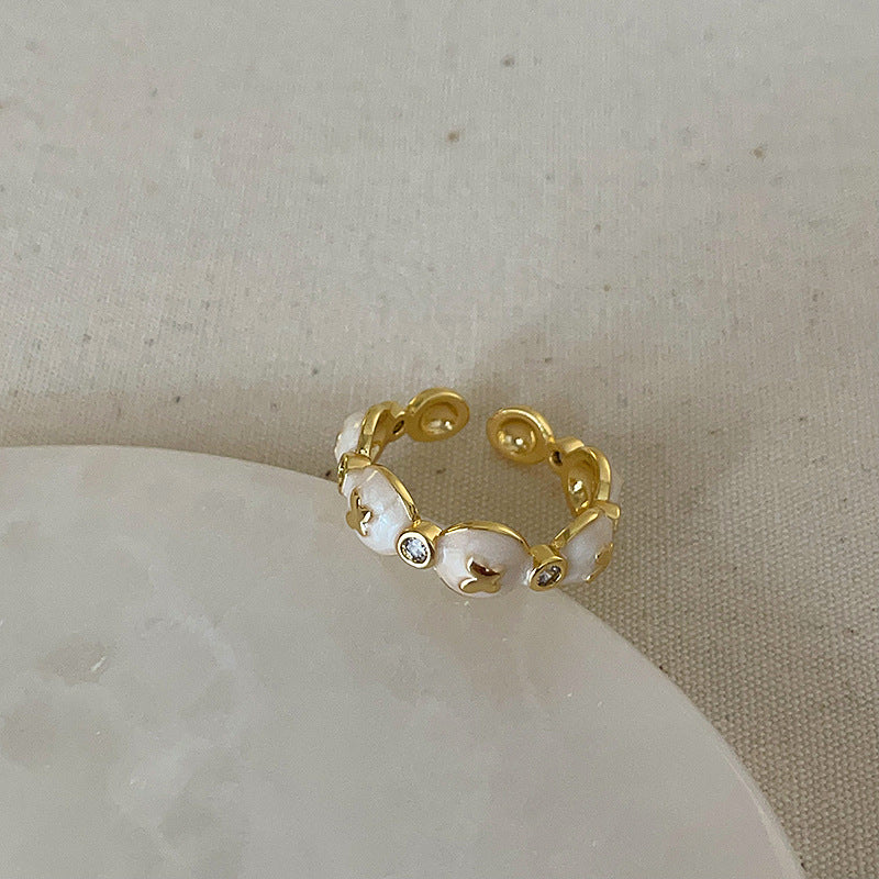 Anello farfalla e fiore viola