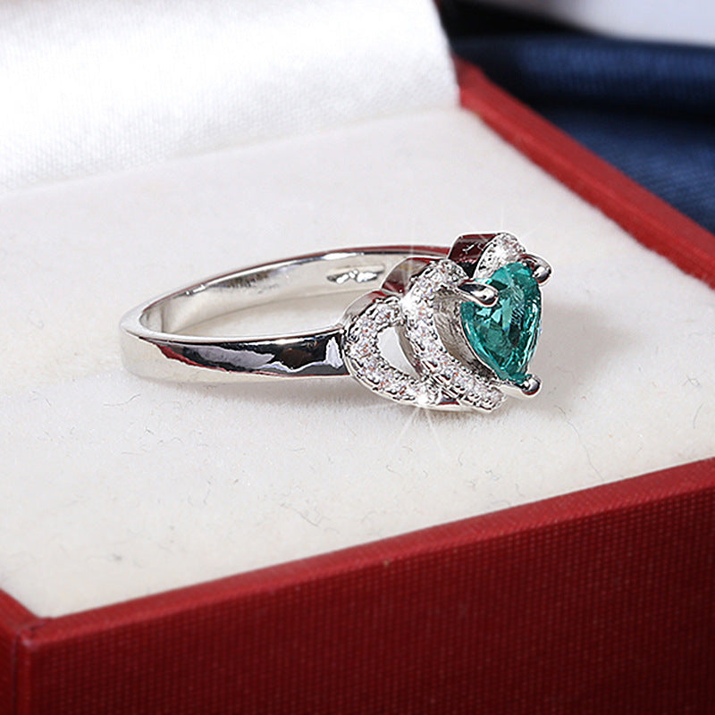 Anello cuore con zircone verde