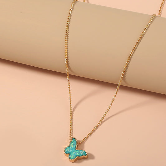 Collana girocollo farfalla in resina verde