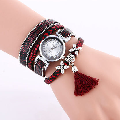 Orologio da donna con fiore e nappa