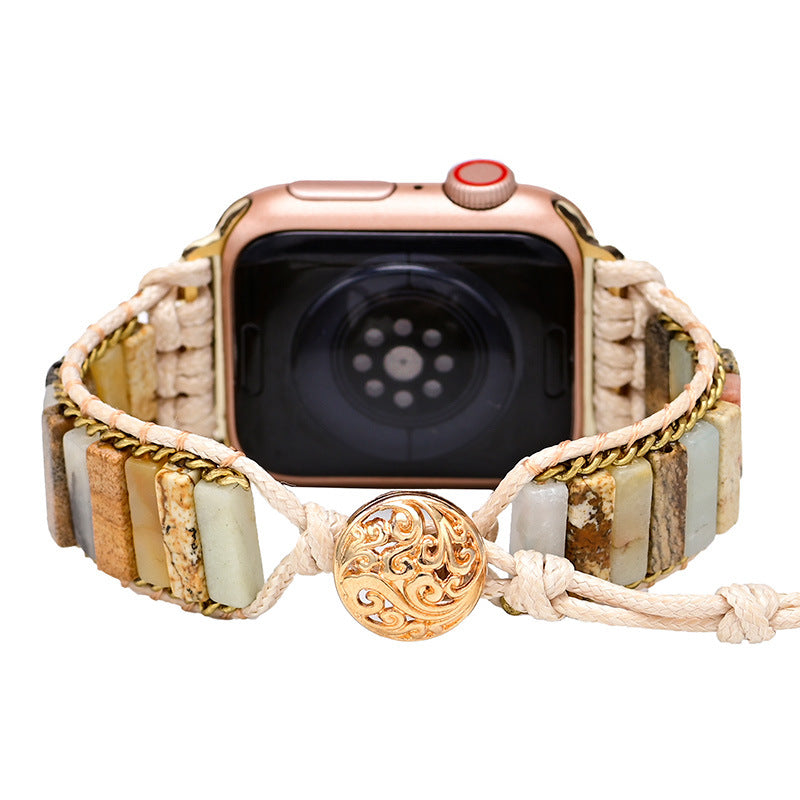 Orologio con cinturino intrecciato pietre