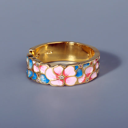 Anello fiore con smalto e strass