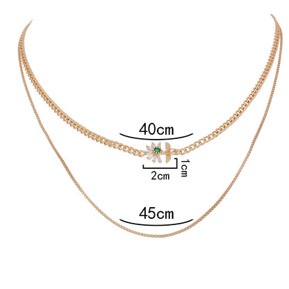 Collana farfalla fiore multistrato