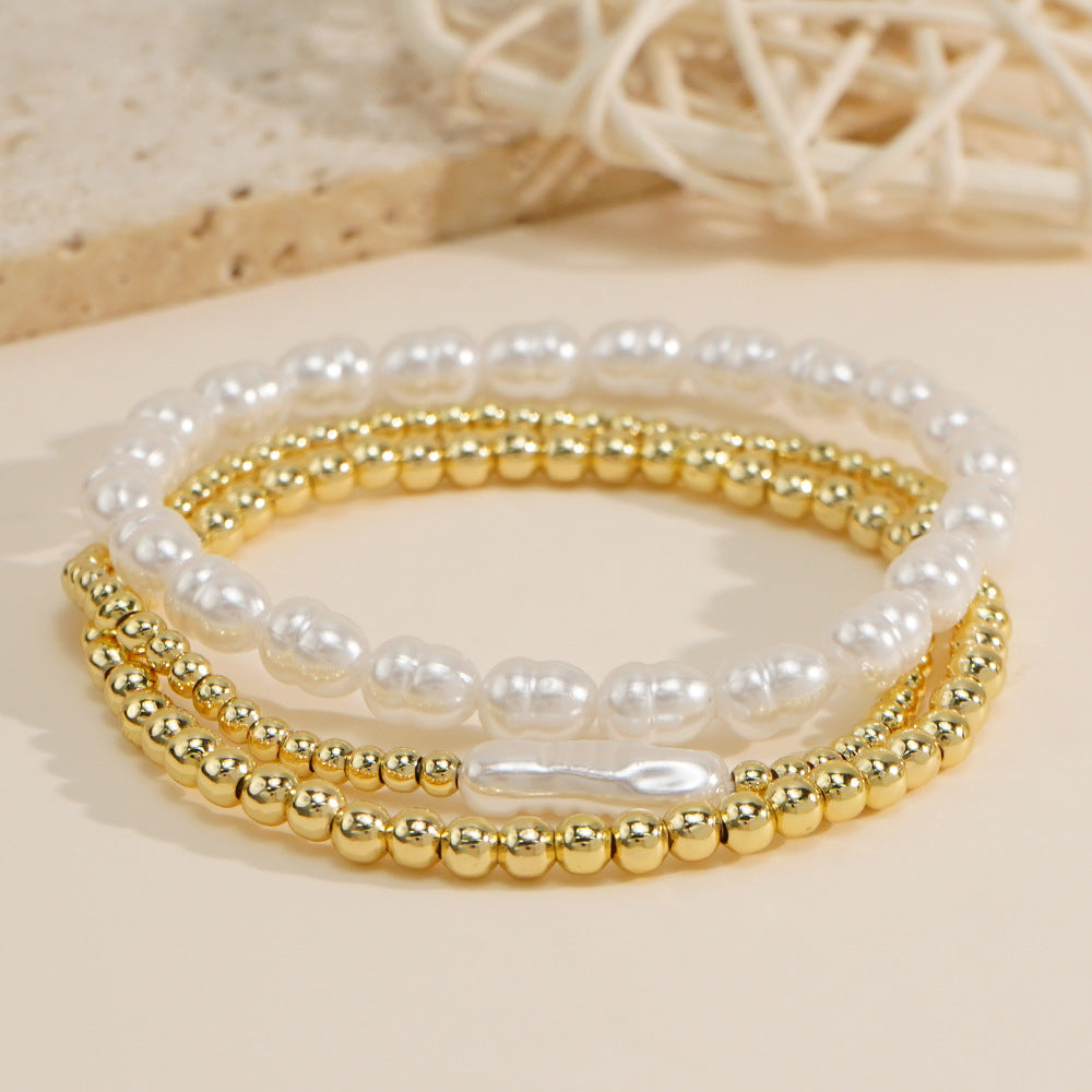 Bracciale perle e sfere dorate