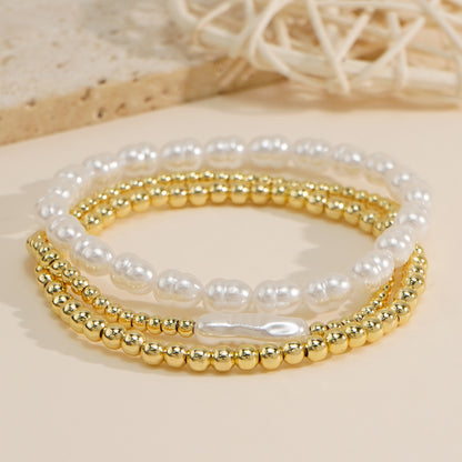 Bracciale perle e sfere dorate