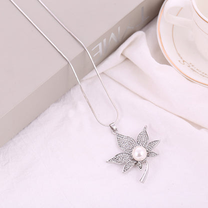 Collana foglie diamanti