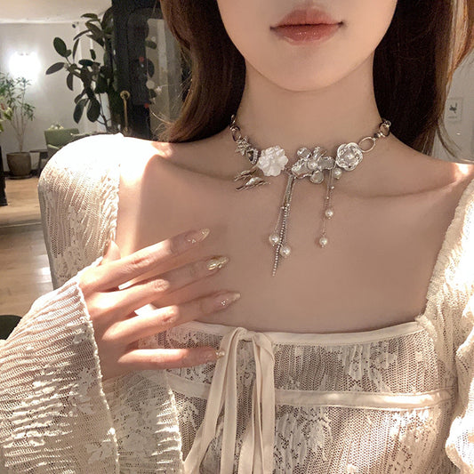 Collana farfalla perla e nappa