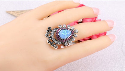 Anello argento fiore opale blu