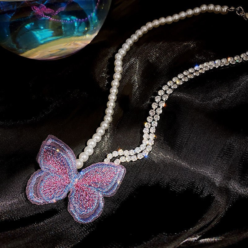 Collana perla farfalla viola