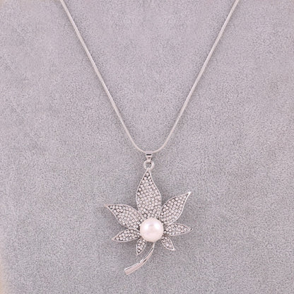 Collana foglie diamanti