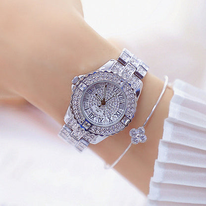 Orologio dorato con cristalli