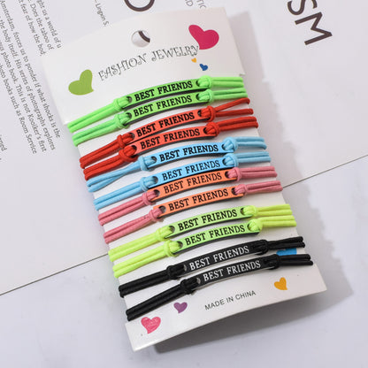 Set bracciali elastici con ciondoli