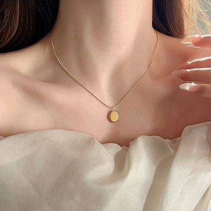 Collana dorata con pendente