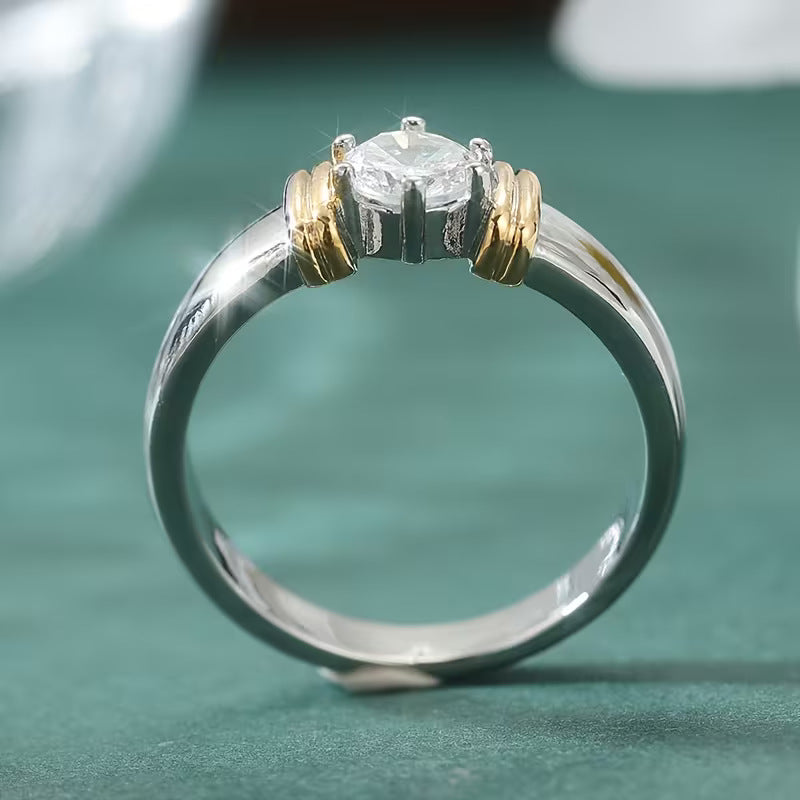 Anello bicolore zirconi tondi