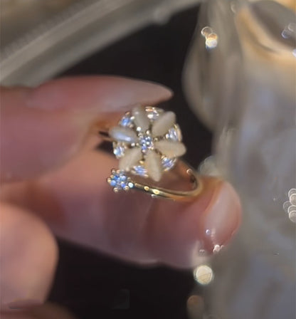 Anello fiore opale rotante